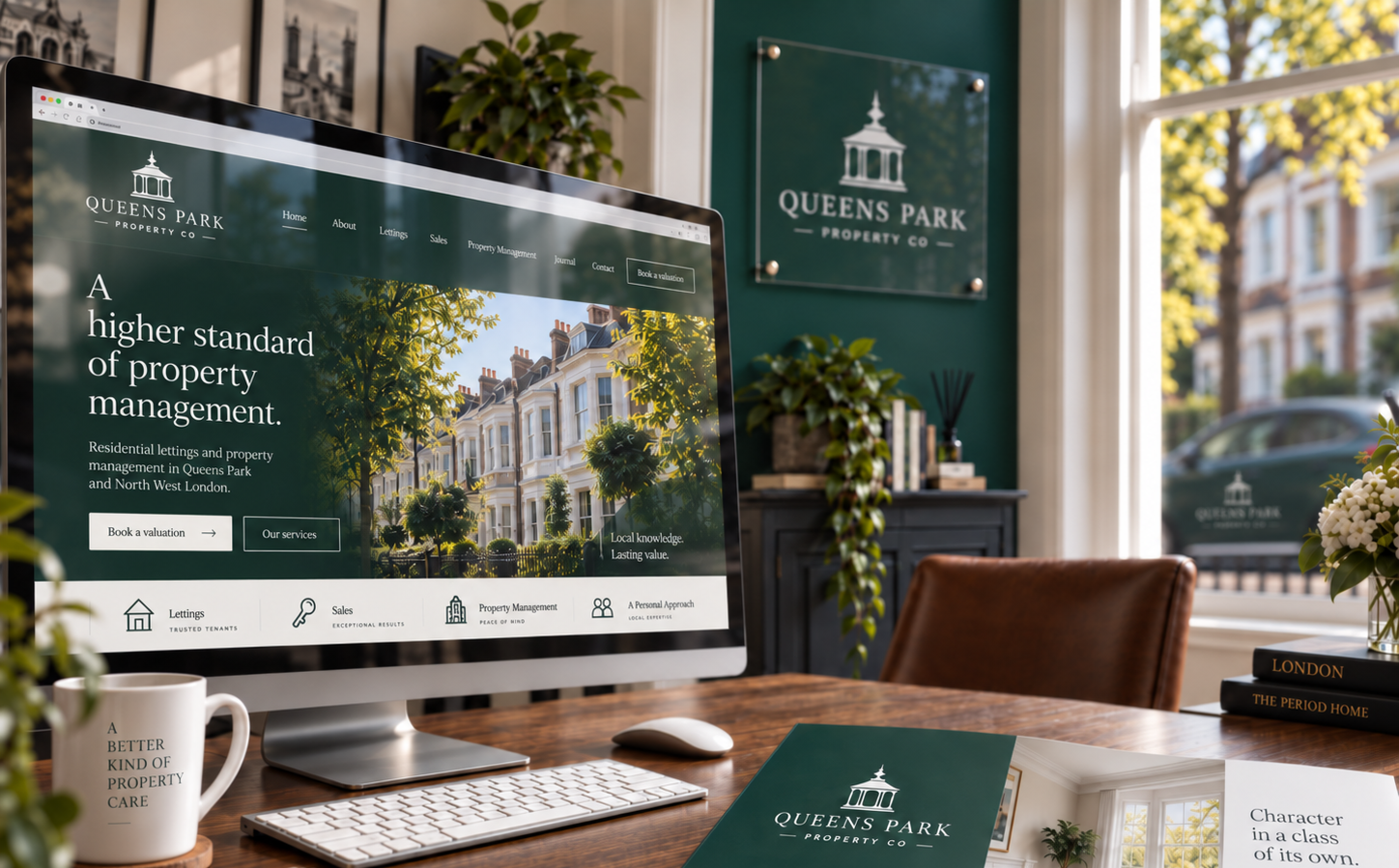 Queens Park Property Co brand shown across its digital and office environment